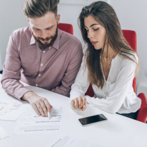 Couple Signing Mortgage Contract
